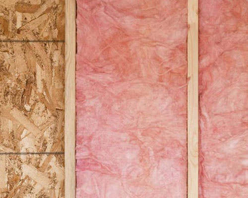 fiberglass bat insulation in an open wall